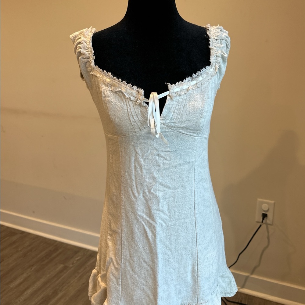 Elegant White Lace-Trimmed Mini Dress